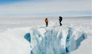 People exploring ice